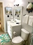 Brand new bath vanity with quartz countertop.